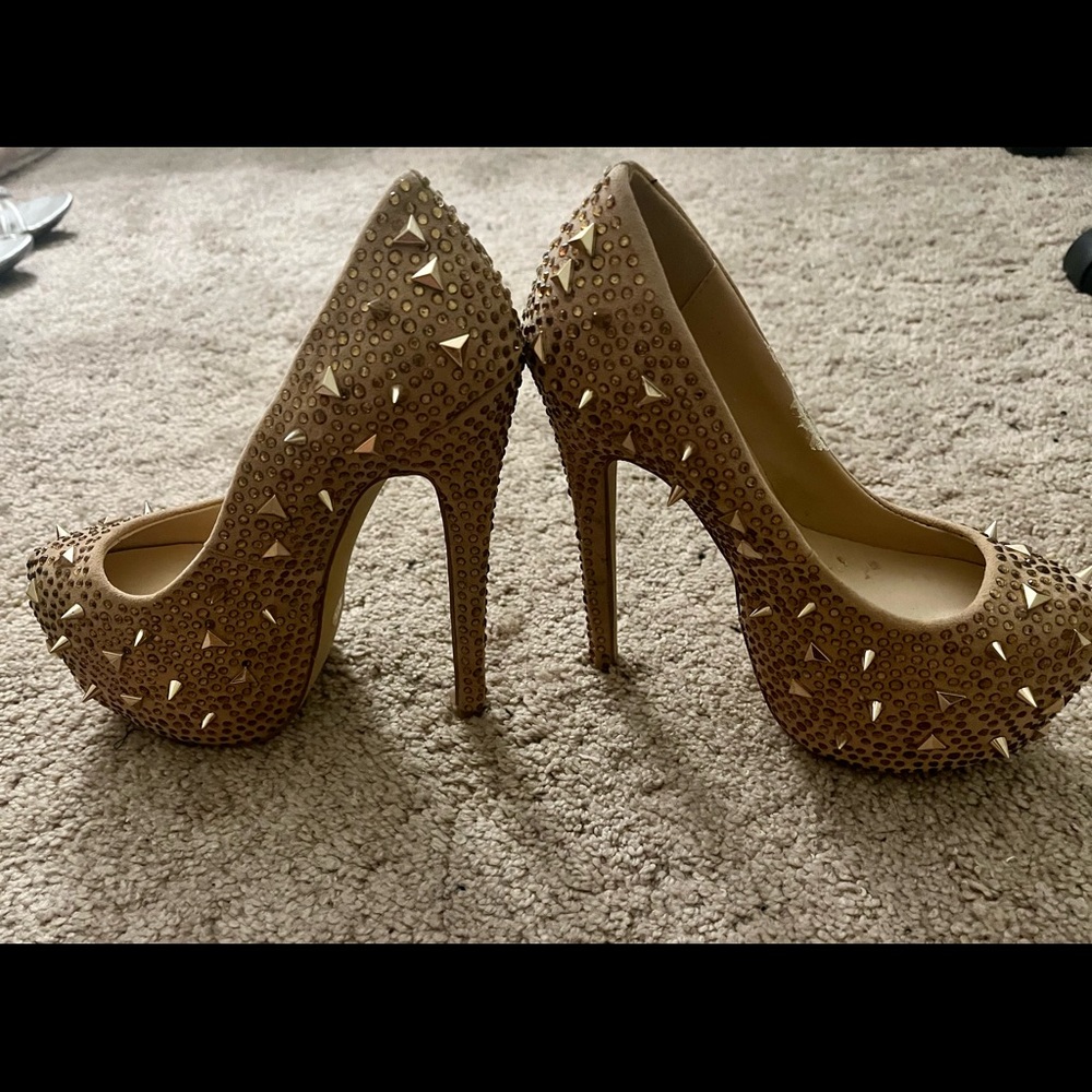 Ultra high platform heels with spikes